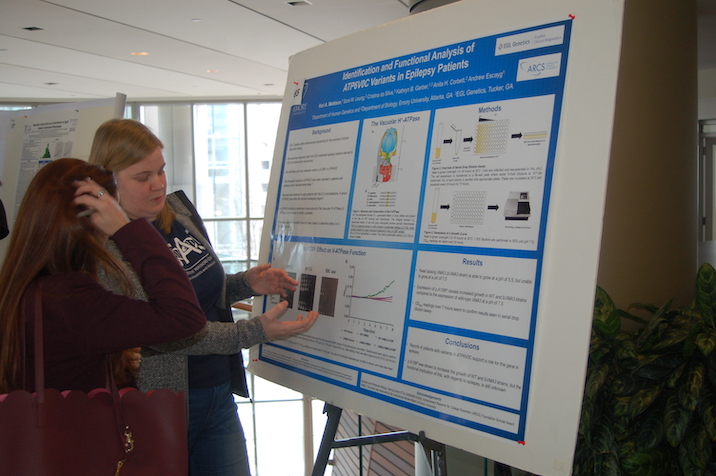 Student presenting poster
