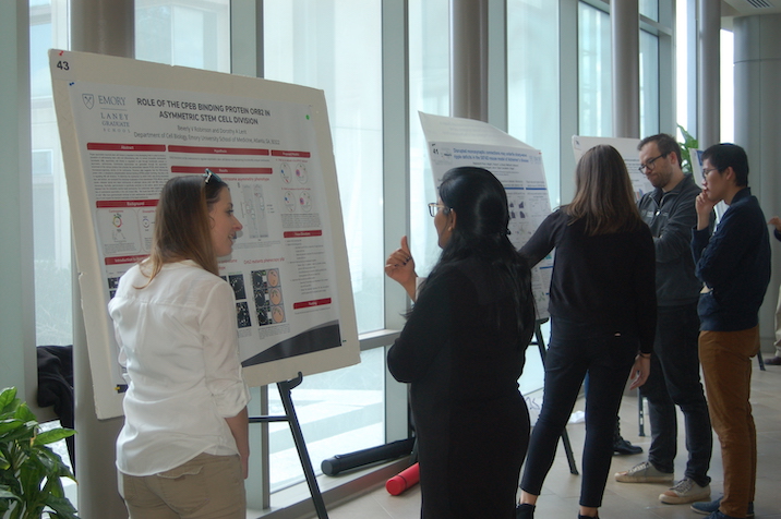 Student presenting poster