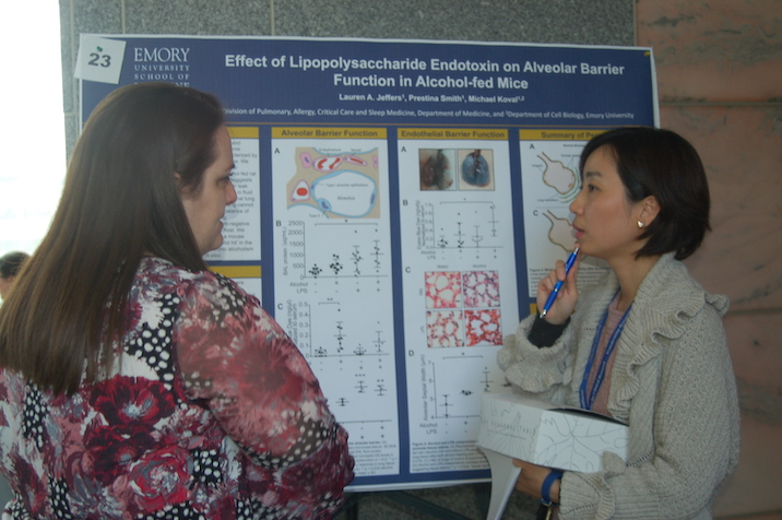 Student presenting poster
