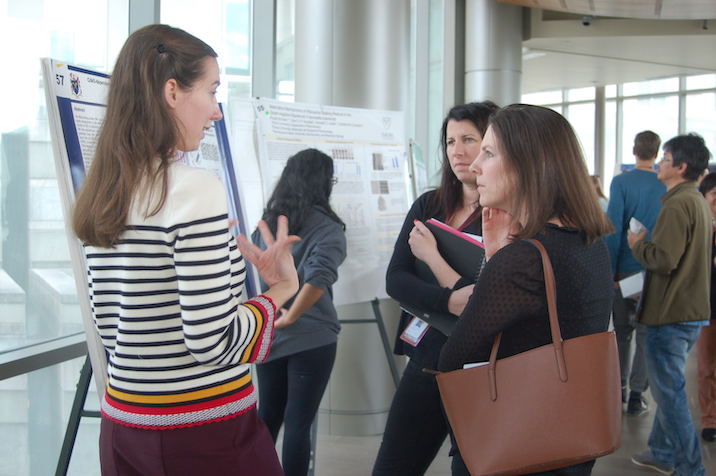 Student presenting poster