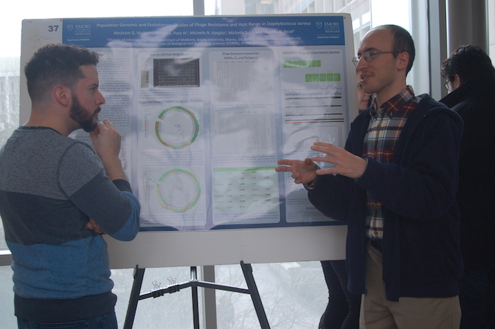 Student presenting poster