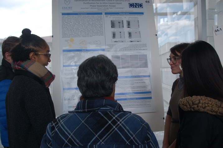 Student presenting poster