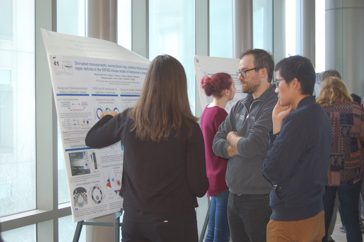 Student presenting poster