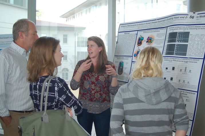 Student presenting poster