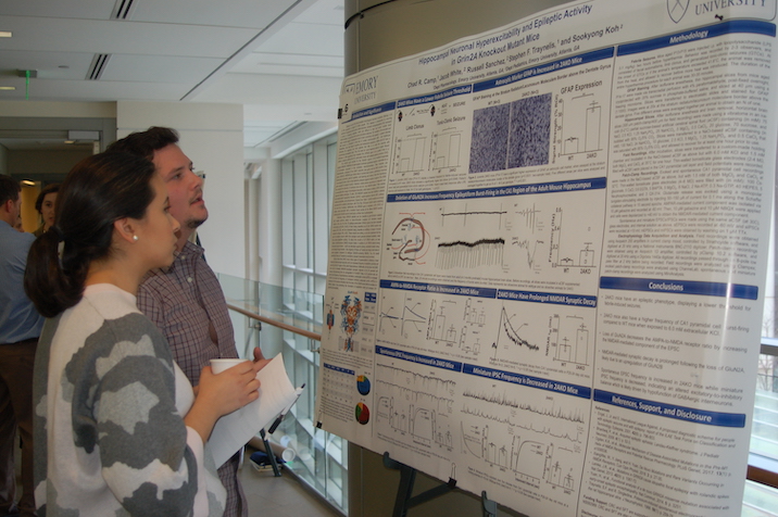 Student presenting poster