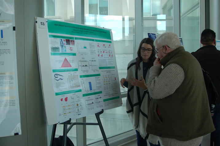 Student presenting poster